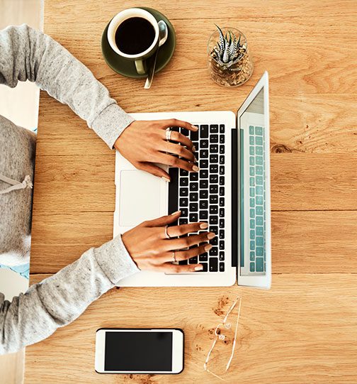 Person typing on a laptop